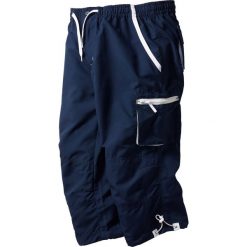 Spodnie 3/4 z mikrofazy, z gumką w talii. Niebieskie spodnie sportowe męskie bonprix, m, bez wzorów. Za 109.99 zł.