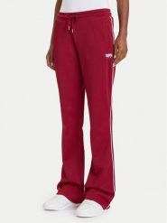 Guess Spodnie dresowe W5BB58 FL04W Bordowy Regular Fit. Czerwone spodnie dresowe damskie Guess, s, z aplikacjami, z dresówki. Za 309.99 zł.