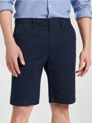Szorty chino - granatowy. Niebieskie spodnie materiałowe męskie Sinsay, m, bez wzorów, z bawełny. Za 49.99 zł.