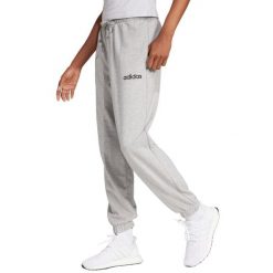 Spodnie damskie adidas Essentials Linear French Terry Cuffed. Szare spodnie sportowe damskie Adidas, bez wzorów, z bawełny, na fitness i siłownię. Za 157.99 zł.