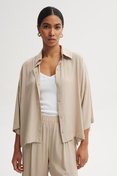 KOSZULA MEL PIASKOWA L - Flawless. Koszule damskie Flawless, l, bez wzorów, z materiału, klasyczne, bez kołnierzyka, bez ramiączek. Za 397.00 zł.
