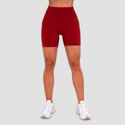 Szorty damskie fitness slim z kieszeniami czerwone Ignite. Czerwone szorty sportowe damskie GYMBEAM, m, bez wzorów, z elastanu, sportowe, na fitness i siłownię. Za 85.90 zł.