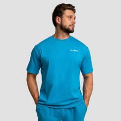 Koszulka męska fitness oversize akwamarynowa Limitless. Niebieskie koszulki sportowe męskie GYMBEAM, m, bez wzorów, z bawełny, bez kołnierzyka, bez ramiączek, na fitness i siłownię. Za 76.90 zł.