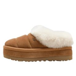 Buty do chodzenia dla dorosłych UGG Tazzlita Slipper Chestnut. Brązowe obuwie sportowe damskie UGG, bez wzorów, z dzianiny, trekkingowe. Za 816.49 zł.