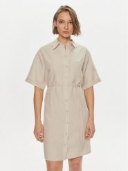 Calvin Klein Sukienka koszulowa K20K206697 Beżowy Relaxed Fit. Brązowe sukienki damskie Calvin Klein, bez wzorów, ze lnu, bez kołnierzyka, bez ramiączek, koszulowe. Za 479.99 zł.
