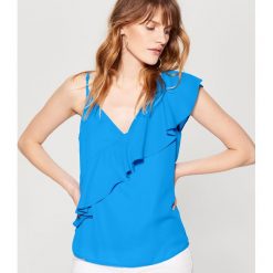 Top z ozdobną falbaną - Niebieski. T-shirty damskie marki Mohito. W wyprzedaży za 49.99 zł.