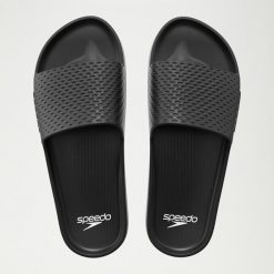Klapki basenowe antypoślizgowe damskie Speedo Slide Entry. Czarne klapki damskie Speedo, bez wzorów, z materiału, bez obcasa. Za 62.99 zł.