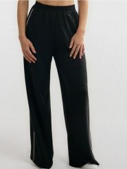 Spodnie dresowe wide leg z lampasami - czarny. Czarne spodnie dresowe damskie Sinsay, l, bez wzorów, z dresówki. Za 49.99 zł.
