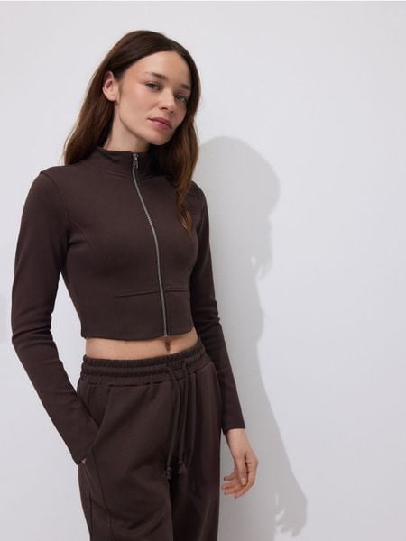 Bluza z wysoką stójką - ciemnobrązowy. Brązowe bluzy damskie Reserved, l, bez wzorów, z bawełny, bez kaptura. Za 79.99 zł.