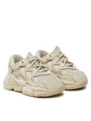 Adidas Sneakersy OZWEEGO IG9026 Beżowy. Brązowe buty sportowe dziewczęce Adidas, bez wzorów, z materiału, bez zapięcia. Za 249.99 zł.