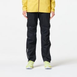 Spodnie do biegania w terenie przeciwdeszczowe damskie Kiprun Run 900 Rain. Czarne spodnie sportowe damskie KIPRUN, l, bez wzorów, z materiału, do biegania. Za 189.99 zł.