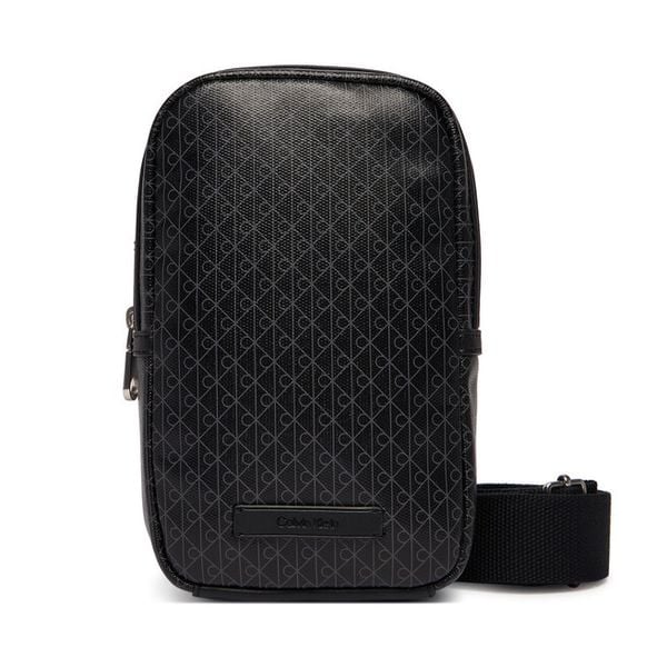 Saszetka Calvin Klein. Czarne saszetki męskie Calvin Klein, młodzieżowe, małe. Za 199.99 zł.