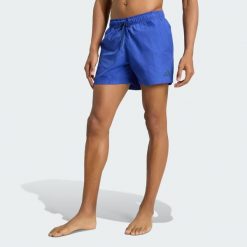 Szorty do pływania z marszczonego nylonu 5 INCH. Niebieskie szorty męskie Adidas, uniwersalny, bez wzorów, z materiału, eleganckie. Za 179.00 zł.