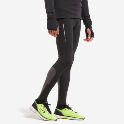 Legginsy do biegania męskie Kiprun Run 500 ocieplane. Czarne legginsy sportowe męskie KIPRUN, m, bez wzorów, z elastanu, do biegania. Za 139.99 zł.