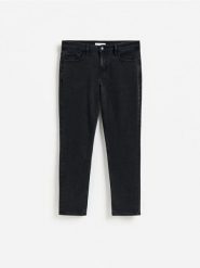 Jeansy slim fit z efektem sprania - czarny. Czarne jeansy męskie Reserved. Za 139.99 zł.