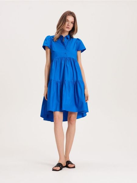 Koszulowa sukienka - niebieski. Niebieskie sukienki damskie Reserved, bez wzorów, z bawełny, bez kołnierzyka, bez ramiączek, koszulowe. W wyprzedaży za 39.99 zł.