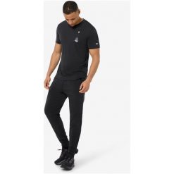 Koszulka SUPER.NATURAL M TEABAG WORLD TEE. Czarne koszulki sportowe męskie super.natural, m, bez wzorów, z materiału, bez kołnierzyka, bez ramiączek. Za 299.99 zł.