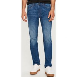 Jeansy regular fit - Niebieski. Niebieskie jeansy męskie Reserved. Za 99.99 zł.