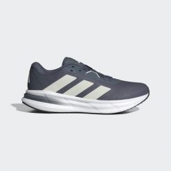 Buty Galaxy 7 Running. Białe buty sportowe męskie Adidas, z syntetyku, bez zapięcia, do biegania. Za 199.00 zł.