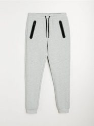 Spodnie dresowe slim - szary. Szare spodnie sportowe męskie Sinsay, l, bez wzorów, z dresówki. Za 69.99 zł.