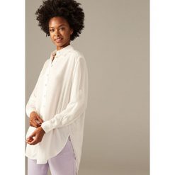 Koszula oversize - Biały. Koszule damskie marki SOLOGNAC. W wyprzedaży za 79.99 zł.