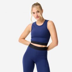 Koszulka fitness damska Domyos crop top. Niebieskie obuwie sportowe damskie DOMYOS, bez wzorów, z elastanu, na fitness i siłownię. Za 69.99 zł.
