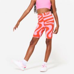Legginsy sportowe dla dzieci Domyos krótkie. Czerwone legginsy dla dziewczynek Decathlon, bez wzorów, z bawełny, krótkie. Za 19.99 zł.