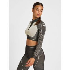 Damska bluza z zamkiem 1/2 crop Hummel MT Mila. Czarne bluzy sportowe damskie Hummel, bez wzorów, bez kaptura, na fitness i siłownię. W wyprzedaży za 213.50 zł.