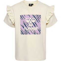 Koszulka dla dziewczynki Hummel Flowy Fuffle. Białe bluzki dla dziewczynek Hummel, bez wzorów, bez kołnierzyka, bez ramiączek. Za 158.50 zł.