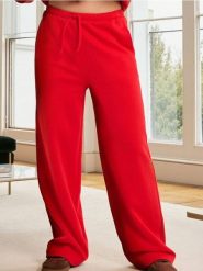 Spodnie wide leg z wiązaniem - czerwony. Czerwone spodnie materiałowe damskie Sinsay, l, bez wzorów. Za 39.99 zł.