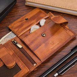 Portfel skórzany męski poziomy klasyczny brązowy RFiD Beltimore D33. Brązowe portfele męskie bez wzorów. Za 59.90 zł.