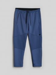 4F Spodnie treningowe szybkoschnące męskie - niebieskie M. Niebieskie spodnie sportowe męskie 4f, l, bez wzorów, na fitness i siłownię. Za 179.99 zł.