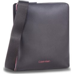 Saszetka CALVIN KLEIN - Double Edge Flat Cro K50K503923 910. Czarne saszetki męskie Calvin Klein, ze skóry ekologicznej, młodzieżowe. Za 349.00 zł.