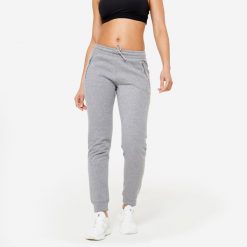 Spodnie dresowe damskie Domyos Gym & Pilates slim. Szare spodnie dresowe damskie DOMYOS, l, bez wzorów, z dresówki. W wyprzedaży za 59.99 zł.