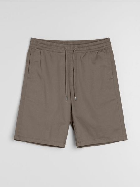 Bawełniane szorty jogger - brązowy. Brązowe szorty męskie Sinsay, m, bez wzorów, z bawełny. Za 39.99 zł.