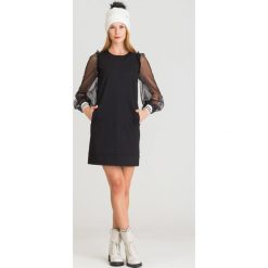 SUKIENKA TWINSET. Czarne sukienki damskie Twinset, na co dzień, bez wzorów, bez kołnierzyka, bez ramiączek, mini, proste. Za 414.50 zł.