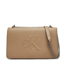 Torebka Calvin Klein Jeans. Brązowe torebki do ręki damskie Calvin Klein Jeans, bez wzorów, z jeansu, wizytowe, bez dodatków. Za 329.99 zł.