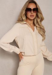 Beżowa Koszula Ozdobiona Subtelną Koronką Anelima. Brązowe bluzki damskie Renee, l, bez wzorów, z jeansu, eleganckie, bez kołnierzyka, bez ramiączek. Za 69.99 zł.