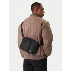 Saszetka Guess Jeans. Czarne saszetki męskie Guess Jeans, z jeansu, młodzieżowe, małe. Za 229.99 zł.