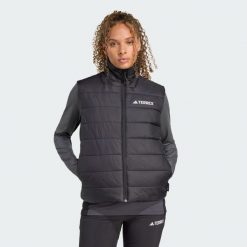 Ocieplana kamizelka Terrex Multi Essentials CLIMAWARM. Czarne kurtki sportowe damskie Adidas, s, bez wzorów, bez kaptura, trekkingowe, climawarm (adidas). Za 349.00 zł.