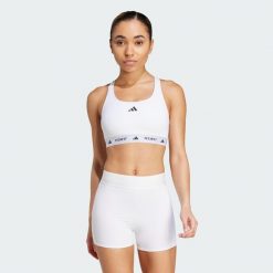 Biustonosz Techfit Medium-Support. Białe obuwie sportowe damskie Adidas, bez wzorów, z materiału, na fitness i siłownię. Za 179.00 zł.