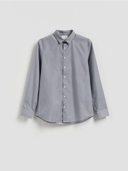Wzorzysta koszula slim fit - granatowy. Niebieskie koszule męskie Reserved, l, bez wzorów, z bawełny, bez kołnierzyka, bez ramiączek. W wyprzedaży za 89.99 zł.