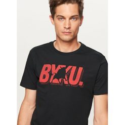 T-shirt z napisem - Czarny. Czarne t-shirty damskie Reserved, l, bez wzorów, bez kołnierzyka. Za 49.99 zł.