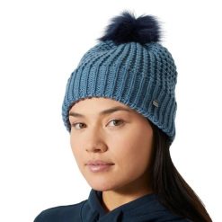 Kapelusz damski Helly Hansen Snowfall. Niebieskie czapki i kapelusze damskie Helly Hansen, na zimę, bez wzorów, z futra. Za 225.50 zł.
