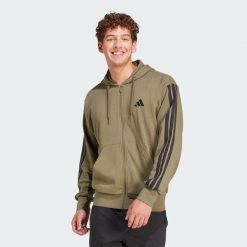 Bluza z kapturem Essentials 3-Stripes French Terry Full-Zip. Brązowe bluzy męskie Adidas, xl, bez wzorów, z materiału, z kapturem. Za 279.00 zł.