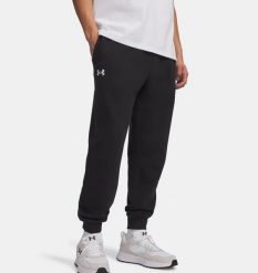 Under Armour UA RIVAL FLEECE JOGGERS Spodnie dresowe męskie. Czarne spodnie sportowe męskie Under Armour, m, bez wzorów, z bawełny. W wyprzedaży za 160.99 zł.