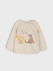 Bluza crewneck Winnie the Pooh - kremowy. Białe bluzy dla niemowląt Sinsay, bez wzorów, bez ramiączek, bez kaptura. Za 17.99 zł.