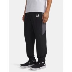 Spodnie męskie Under Armour Tech Sport black/castlerock/white. Czarne buty sportowe męskie Under Armour, m, bez wzorów, na fitness i siłownię. Za 299.99 zł.