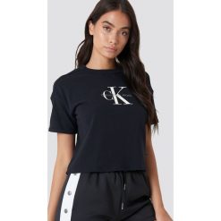 Calvin Klein T-shirt Teco True Icon - Black. Czarne t-shirty damskie Calvin Klein, z nadrukiem, z bawełny. Za 202.95 zł.