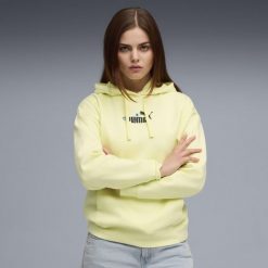 Damska bluza z kapturem Essentials Nature 2.0 Comfort PUMA Gold Moon Yellow. Żółte bluzy sportowe damskie Puma, bez wzorów, z kapturem, do biegania. Za 249.00 zł.